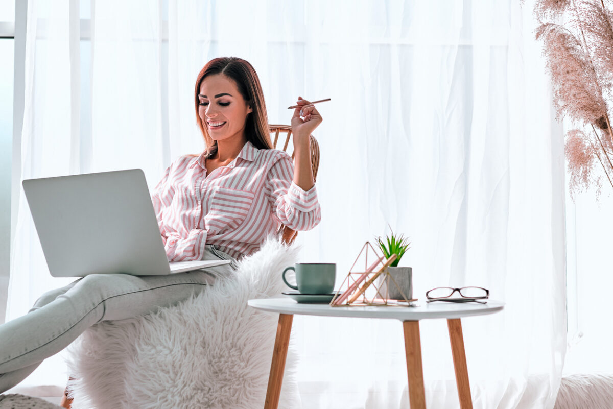 Woman finding inspiration for designing an email template for abandoned cart.