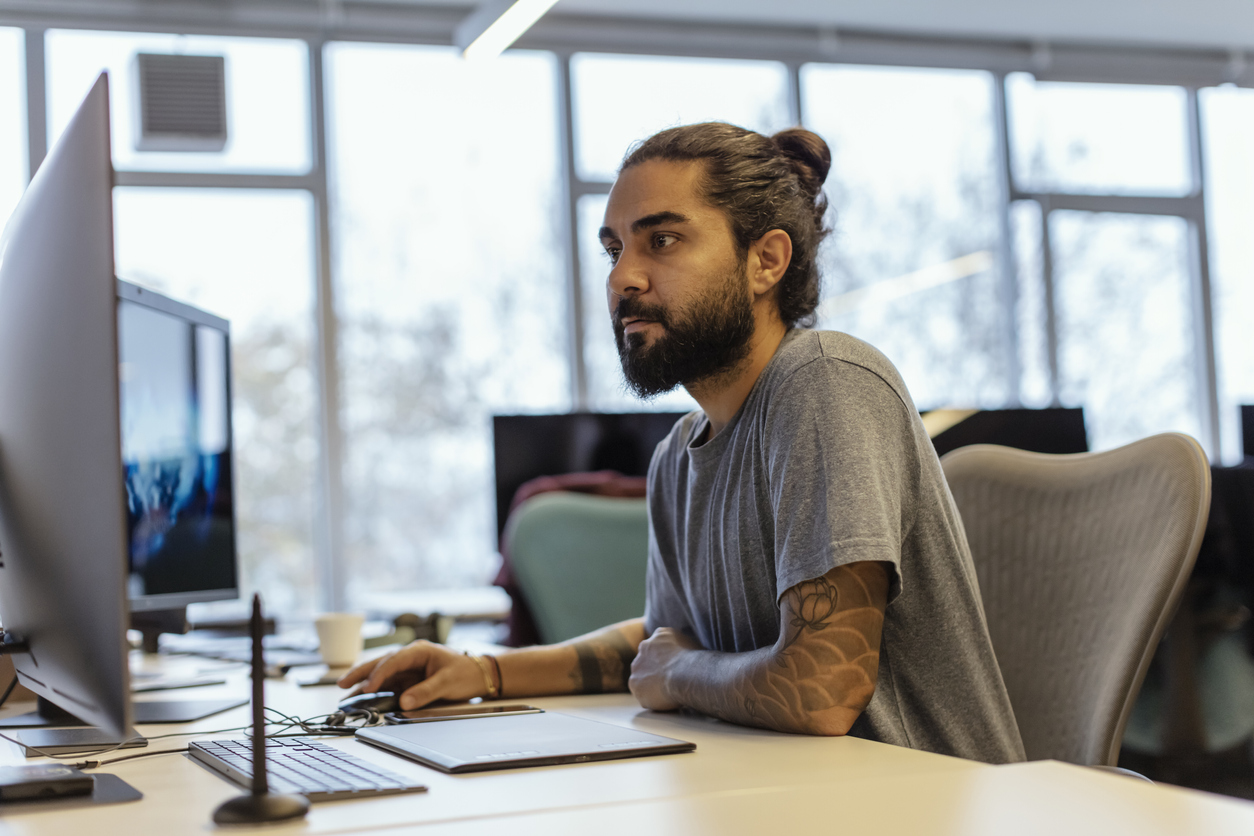 A man searches for an ecommerce email template.
