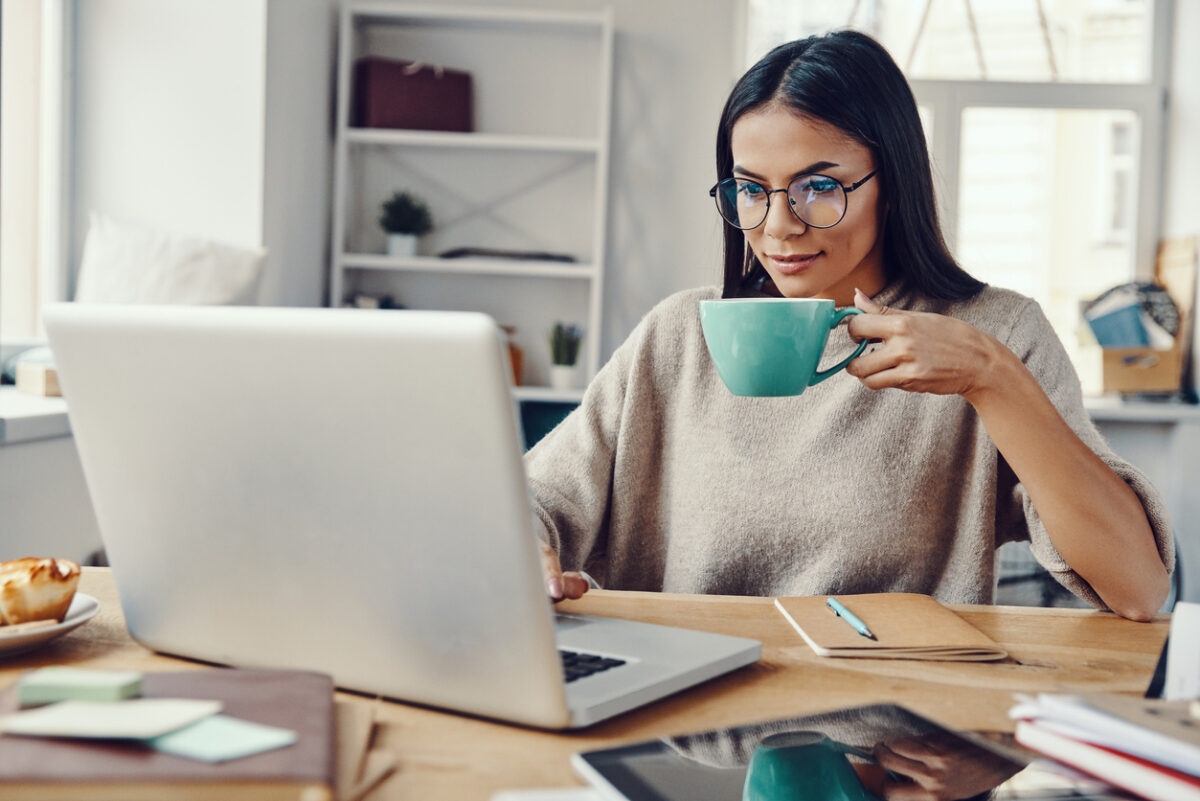 Woman reading about email segmentation on Mailchimp.