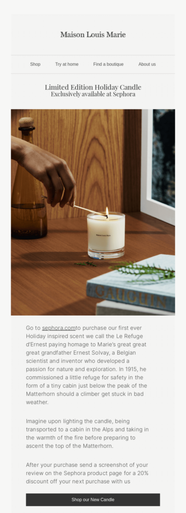Email design with lit candle placed on a table, casting a warm glow in the surrounding area.